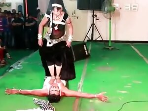 Indian Lady Trampling Man in Dance in Public