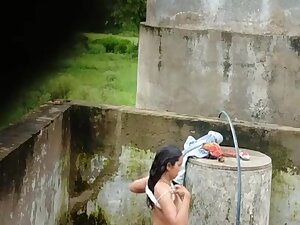 Indian Village Girl Bathing Near Water Tank Outdoor