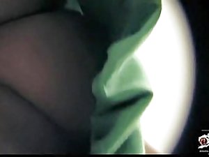 Girl in green dress on the hidden upskirt cam video