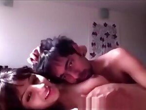 Indian couple having sex in front of their computer