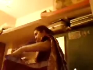 Aunty changes from costume to saree