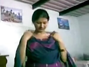 Divya Mol in Violet Dress