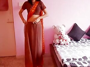 Hot Housewife Wearing Saree And Showing Navel