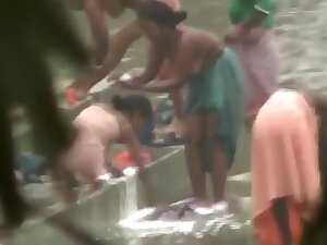 Indian wives wash their breasts